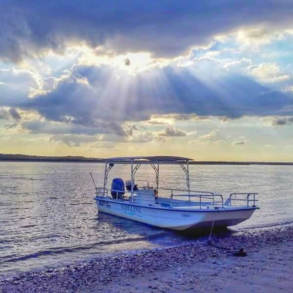 a small boat in a body of water